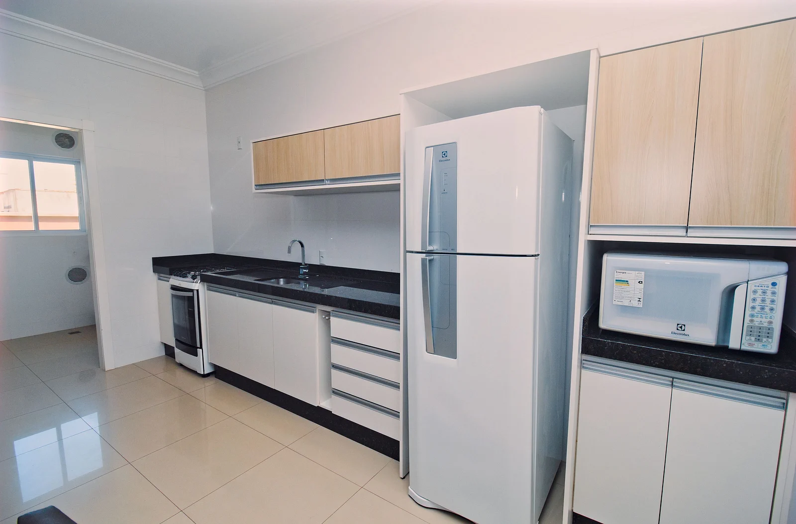 Foto oficial · Baía dos Golfinhos — Apartamento 304, 2 dormitórios · 12