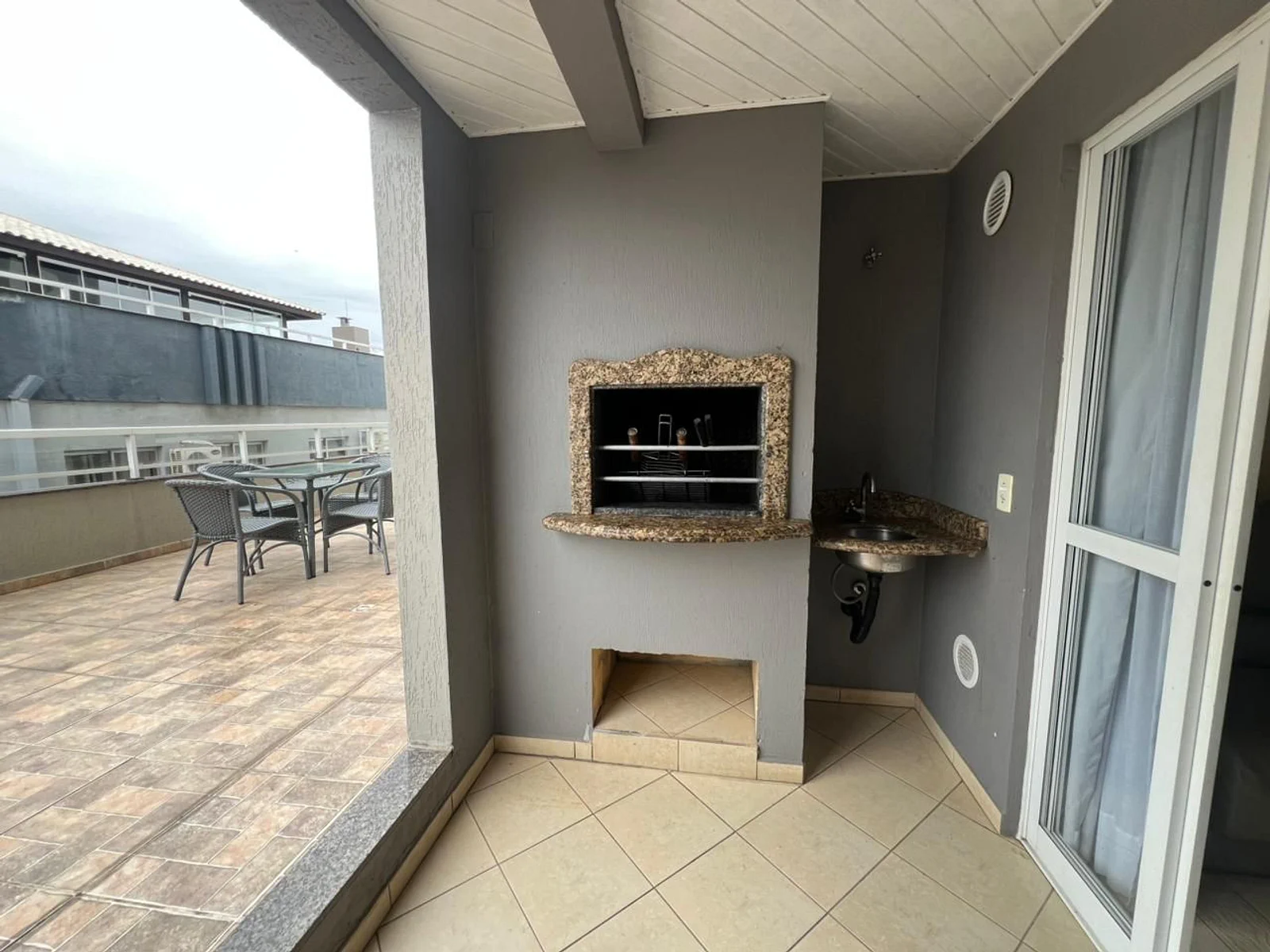 Foto oficial · Vista Bella — Apartamento 104, 2 dormitórios, fundos com terraço · 17