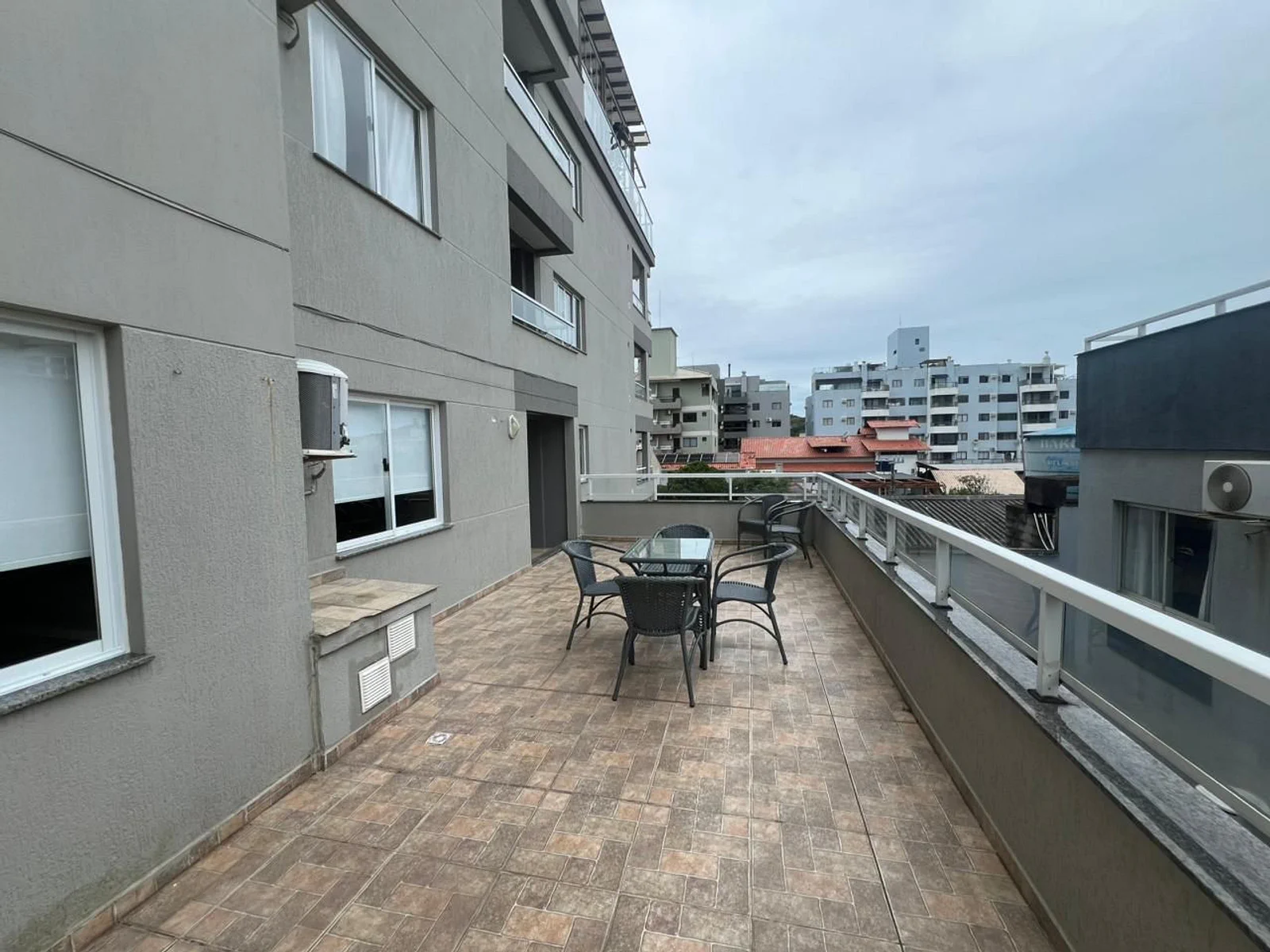 Foto oficial · Vista Bella — Apartamento 104, 2 dormitórios, fundos com terraço · 20