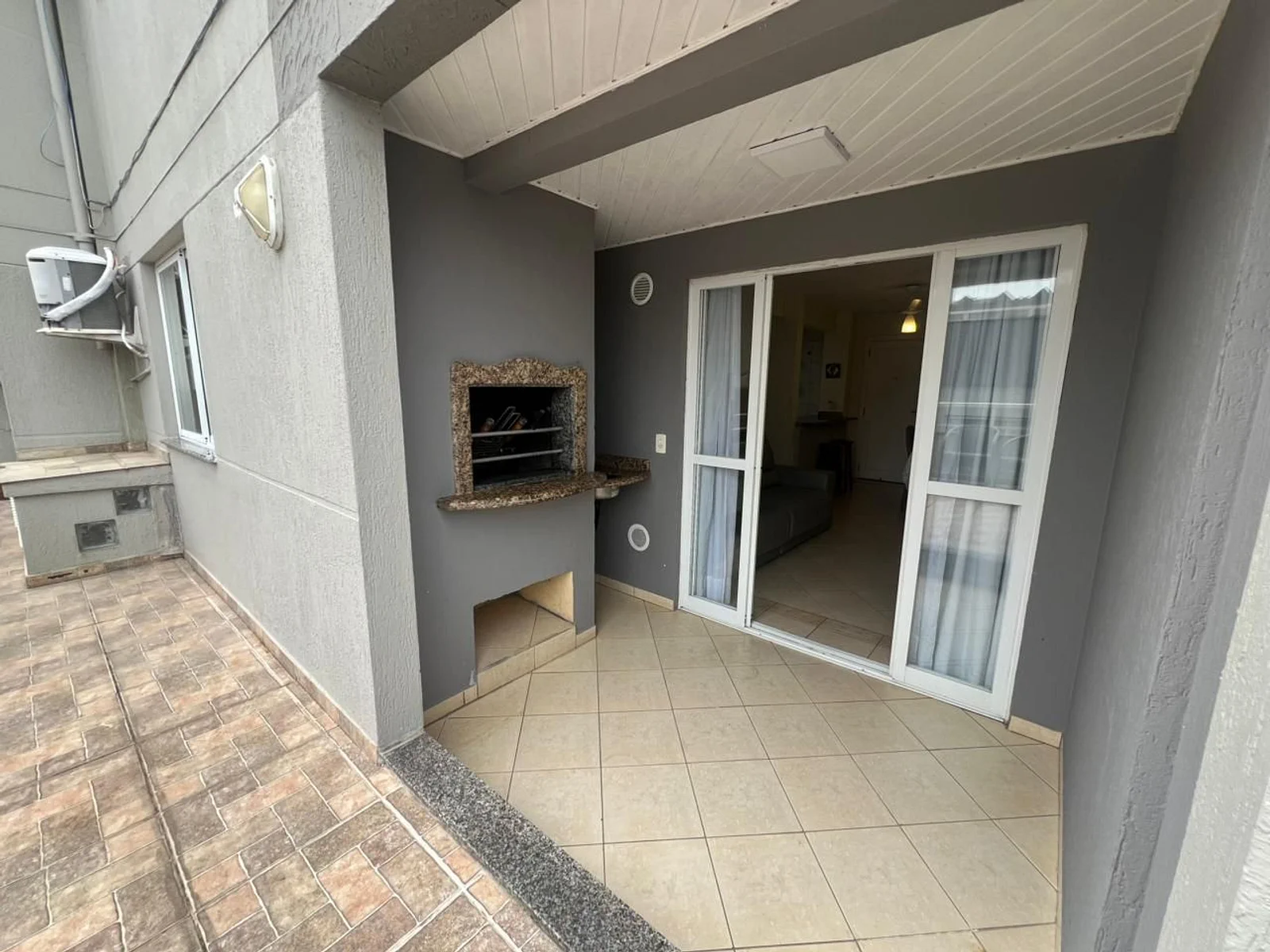 Foto oficial · Vista Bella — Apartamento 104, 2 dormitórios, fundos com terraço · 21