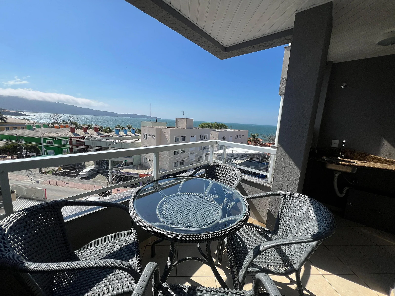 Foto oficial · Vista Bella — Apartamento 301, 1 dormitório, lateral · 5
