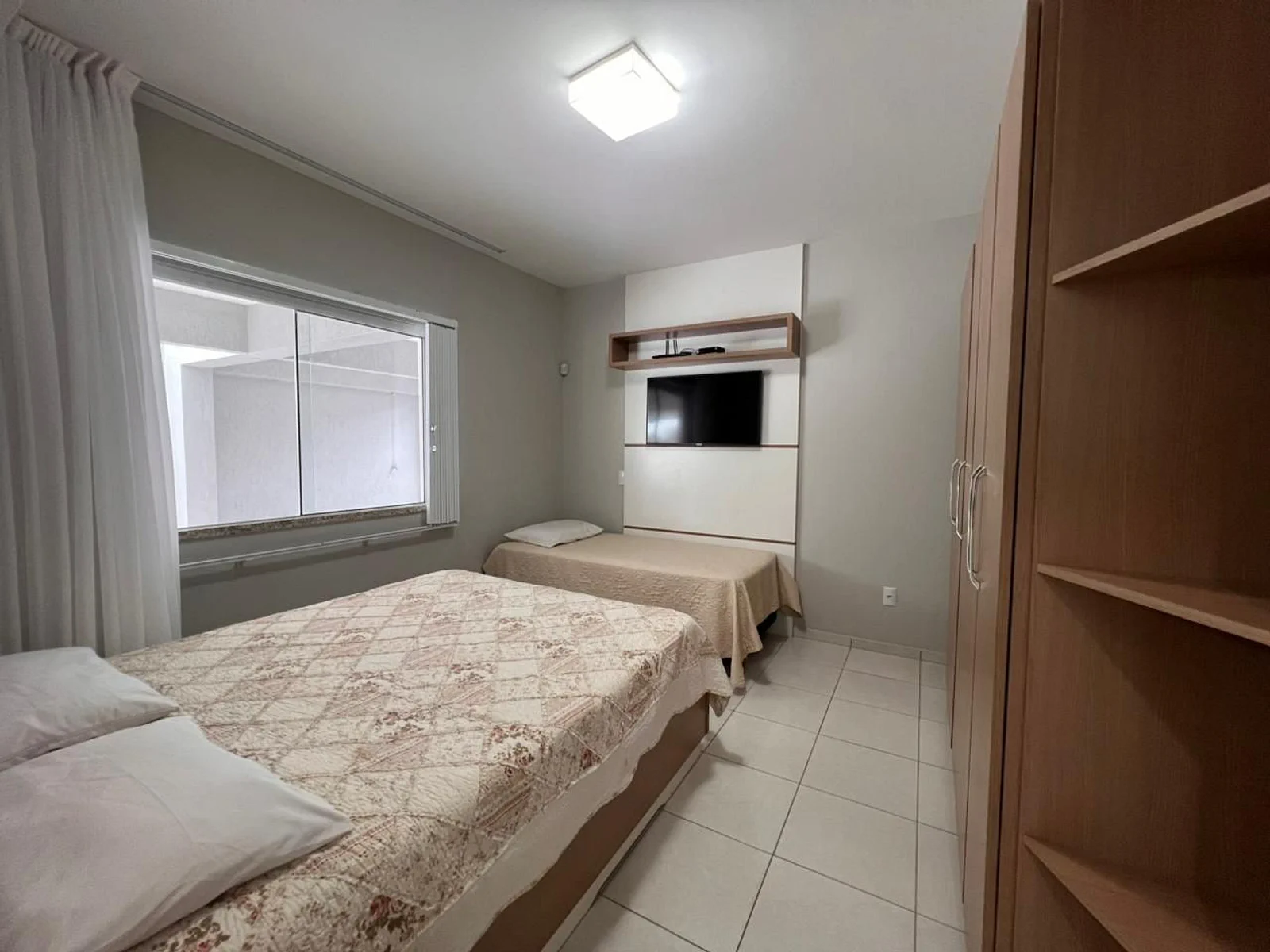 Foto oficial · Casa de três dormitórios — Até 8 hóspedes (YO01I) · 7