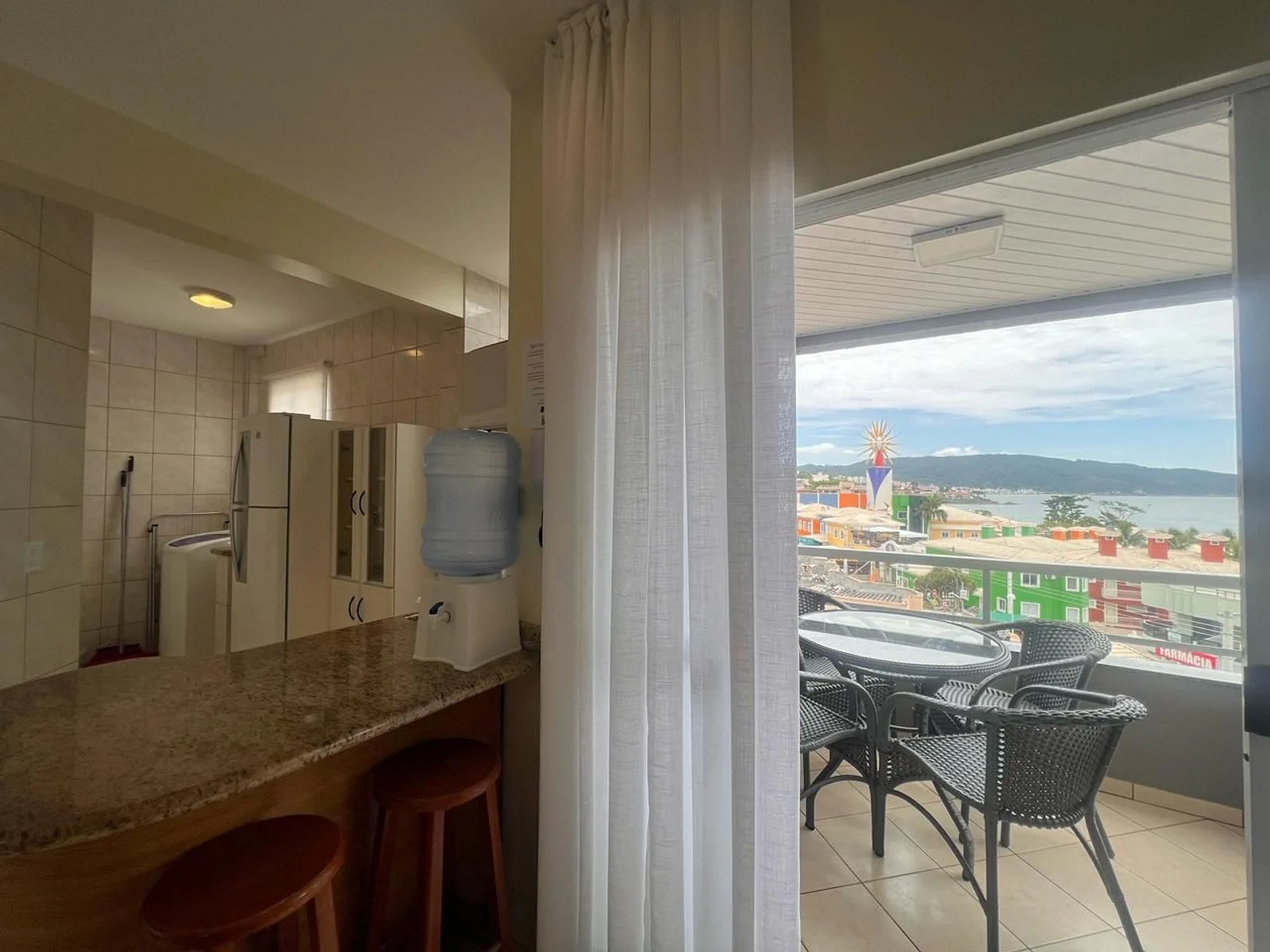 Foto oficial · Vista Bella — Apartamento 301, 1 dormitório, lateral · 10