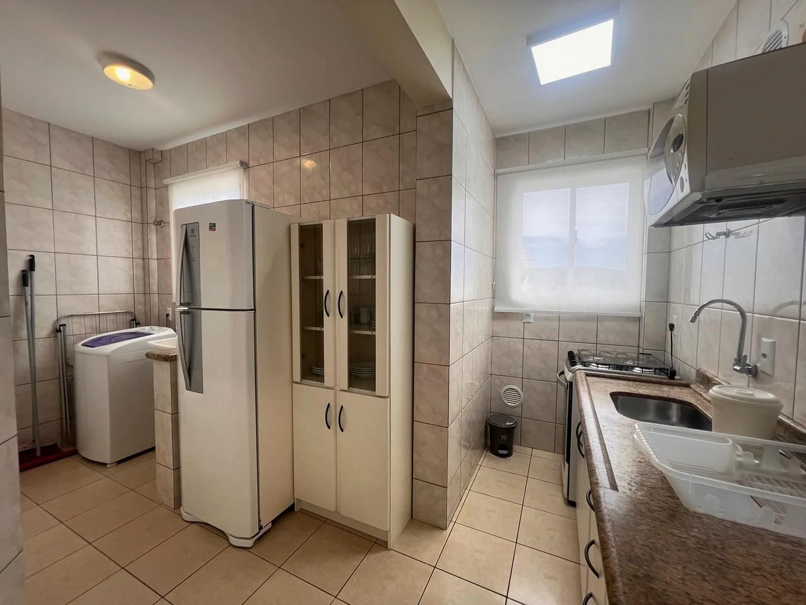 Foto oficial · Vista Bella — Apartamento 301, 1 dormitório, lateral · 15